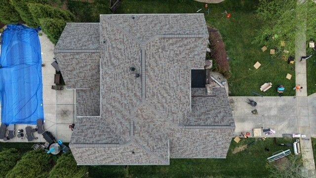 Overhead drone view of a new roof installation in progress