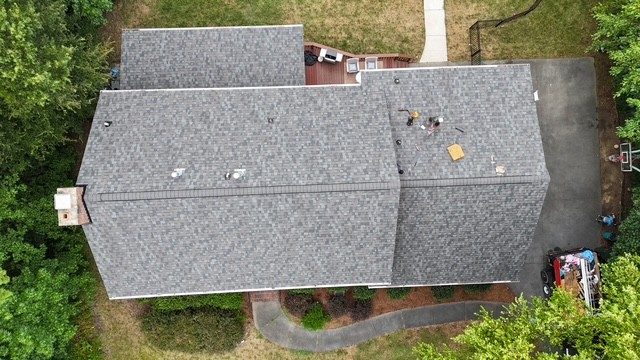 Drone view of a completed roof replacement on a Charlotte, NC home