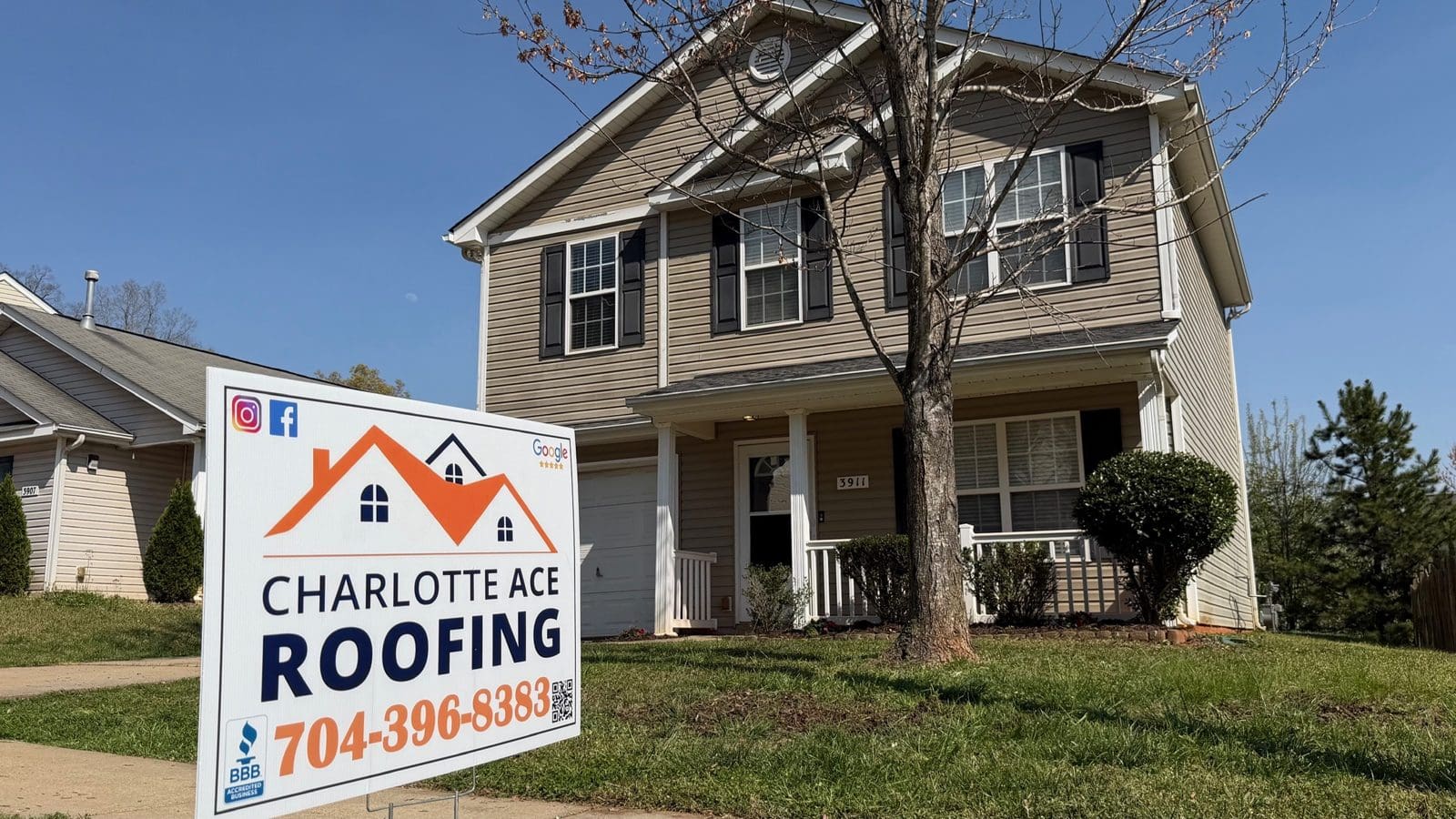 Charlotte Ace Roofing yard sign in front of a home with a new roof
