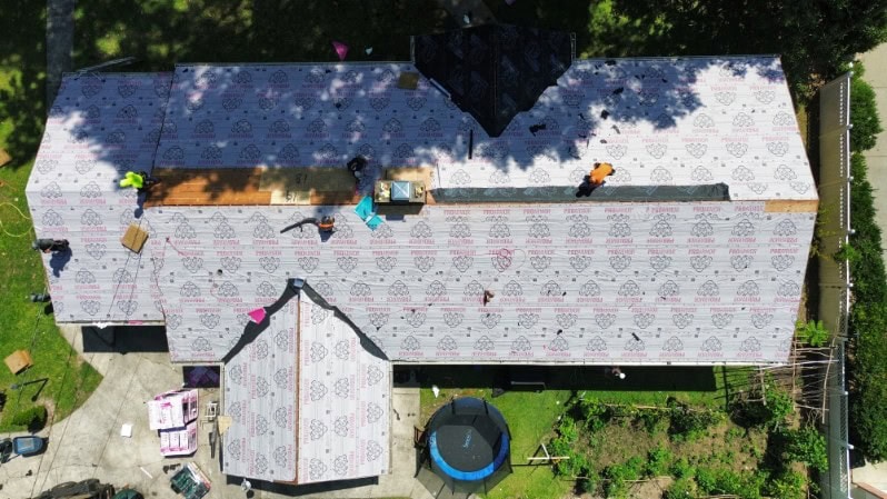 Synthetic underlayment installed during a roof replacement on Monroe Rd, Charlotte NC