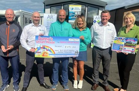 A group photo of charity golfers