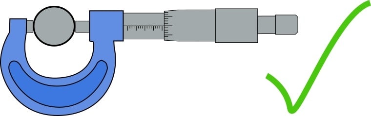 demonstrating the correct way to use a micrometer