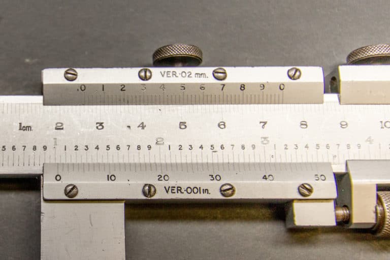 A vernier scale reading of 1.022"