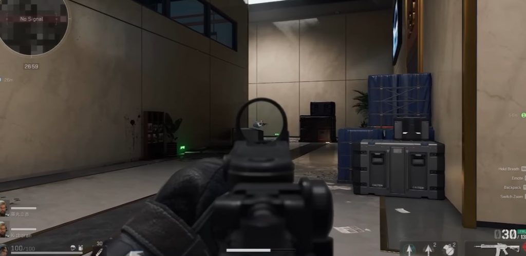 Delta Force first person combat view aiming down sights inside a modern building corridor with crates and cover points