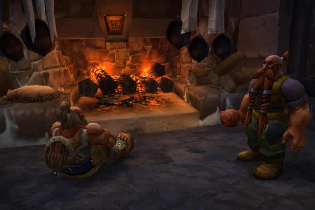 Two dwarf characters resting near a fireplace in an inn in a WoW Classic Hardcore scene