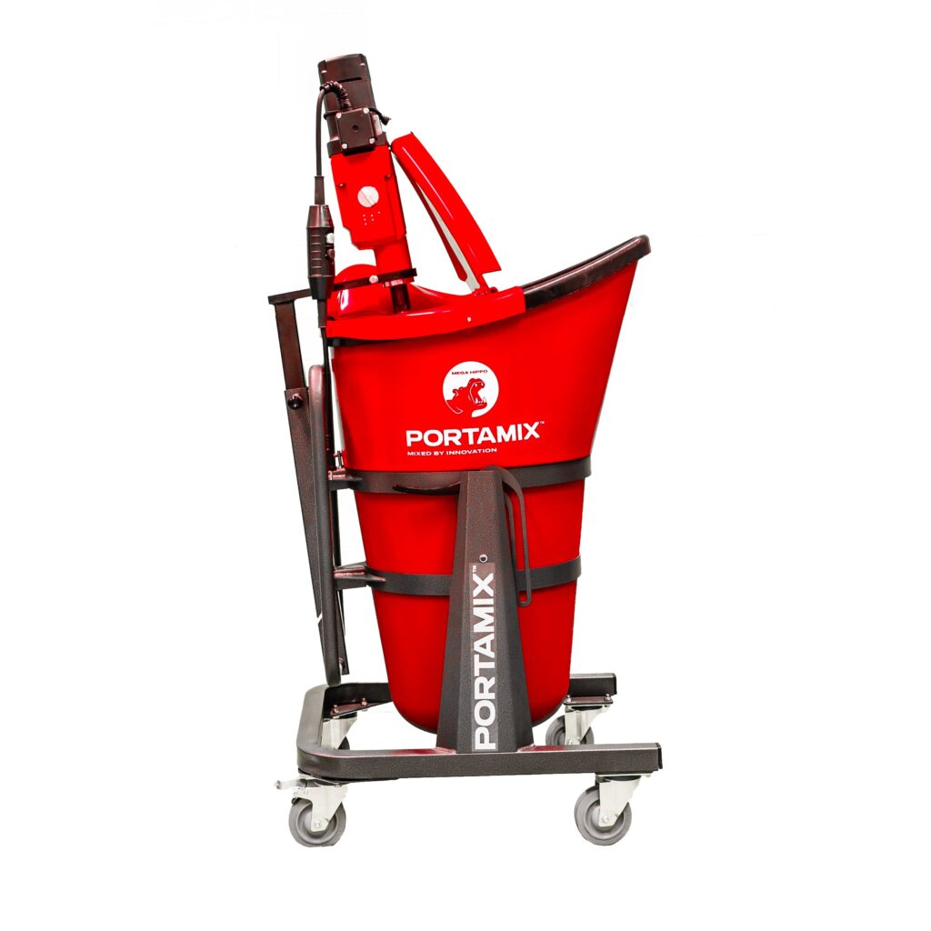 A red bucket on a dolly.