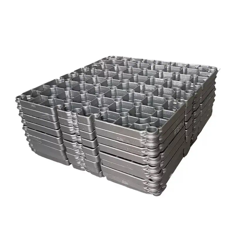 Cast heat treatment baskets showing the grid, wall and lifting features that should be checked during failure analysis