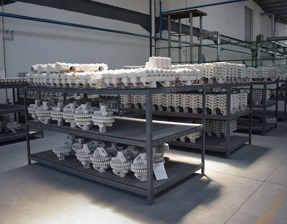 Ceramic shell castings organized by production batch in a foundry