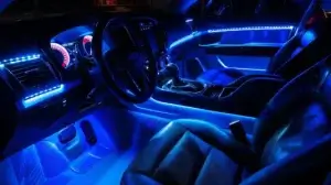 Car interior with blue ambient lighting