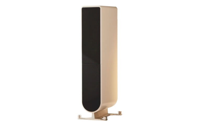 The PS Audio Aspen FR10 speakers in an ivory or off-white finish.