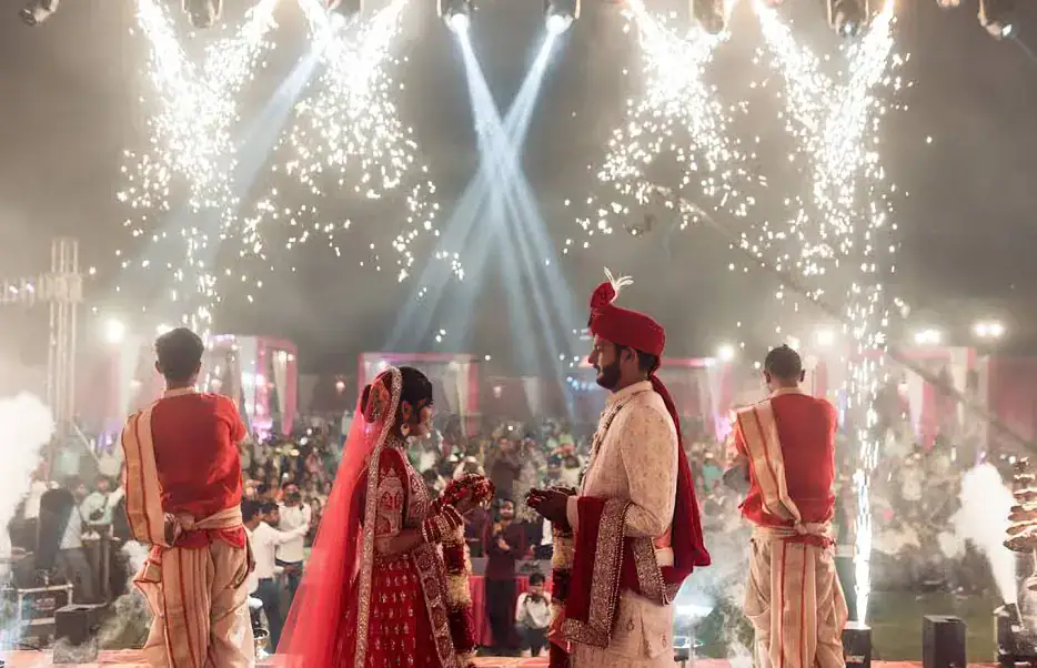 Bride and groom blessing ceremony with fireworks finale at Ganga Aarti wedding Evnet