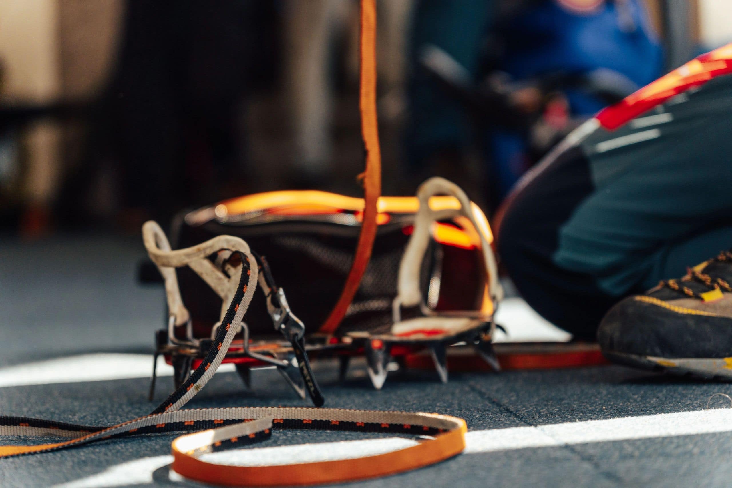Crampons used on hard alpine snow where material and point geometry matter