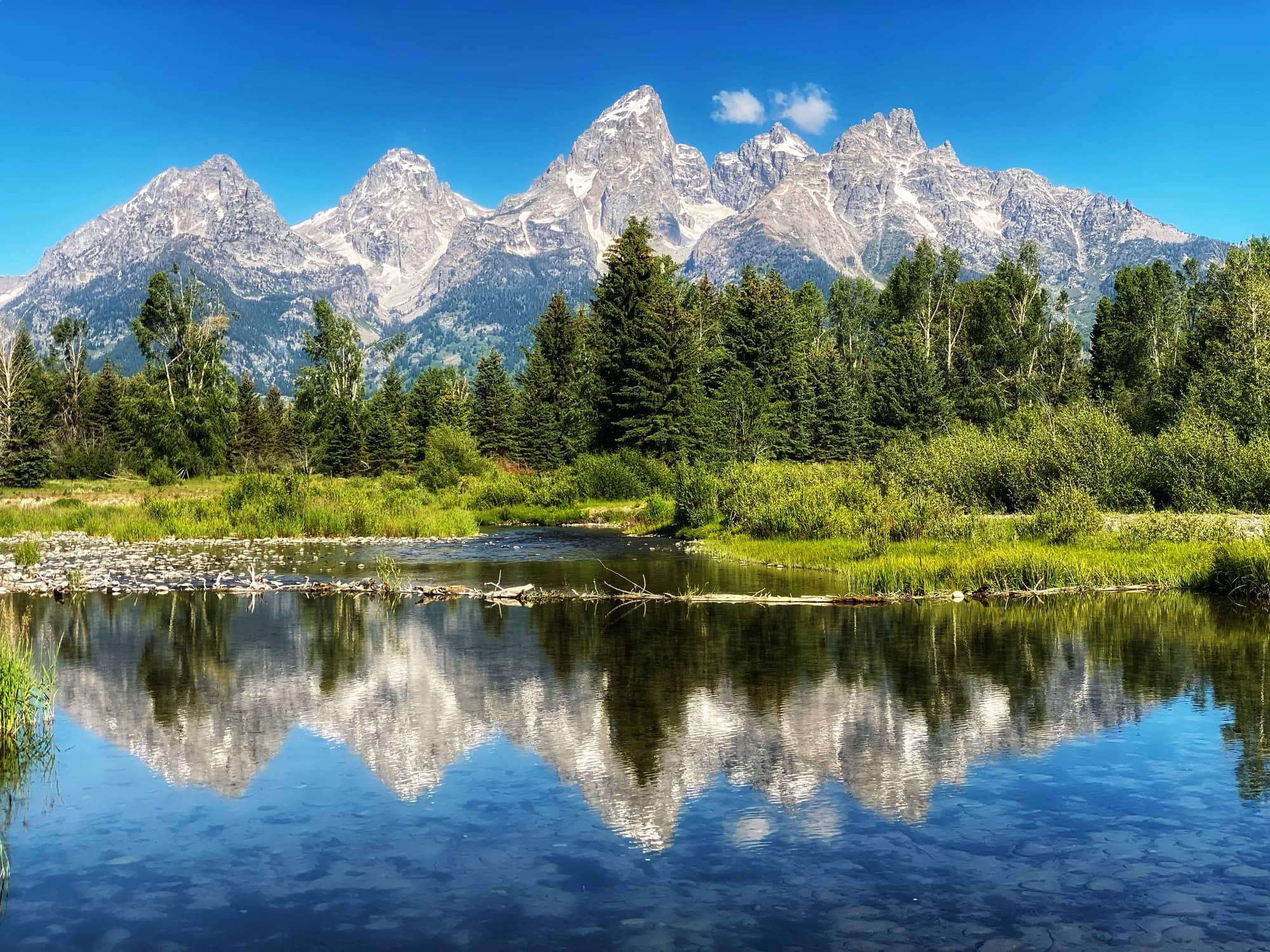 Grand Teton and the Teton Range reflected in a Wyoming river