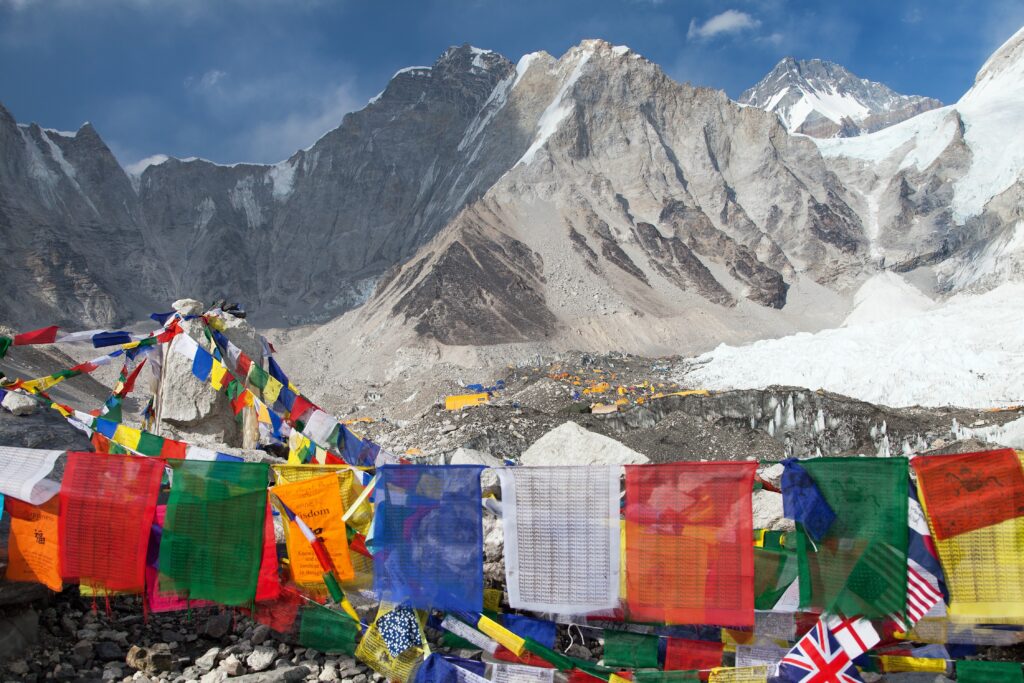 Mountaineering crampons being inspected and maintained
