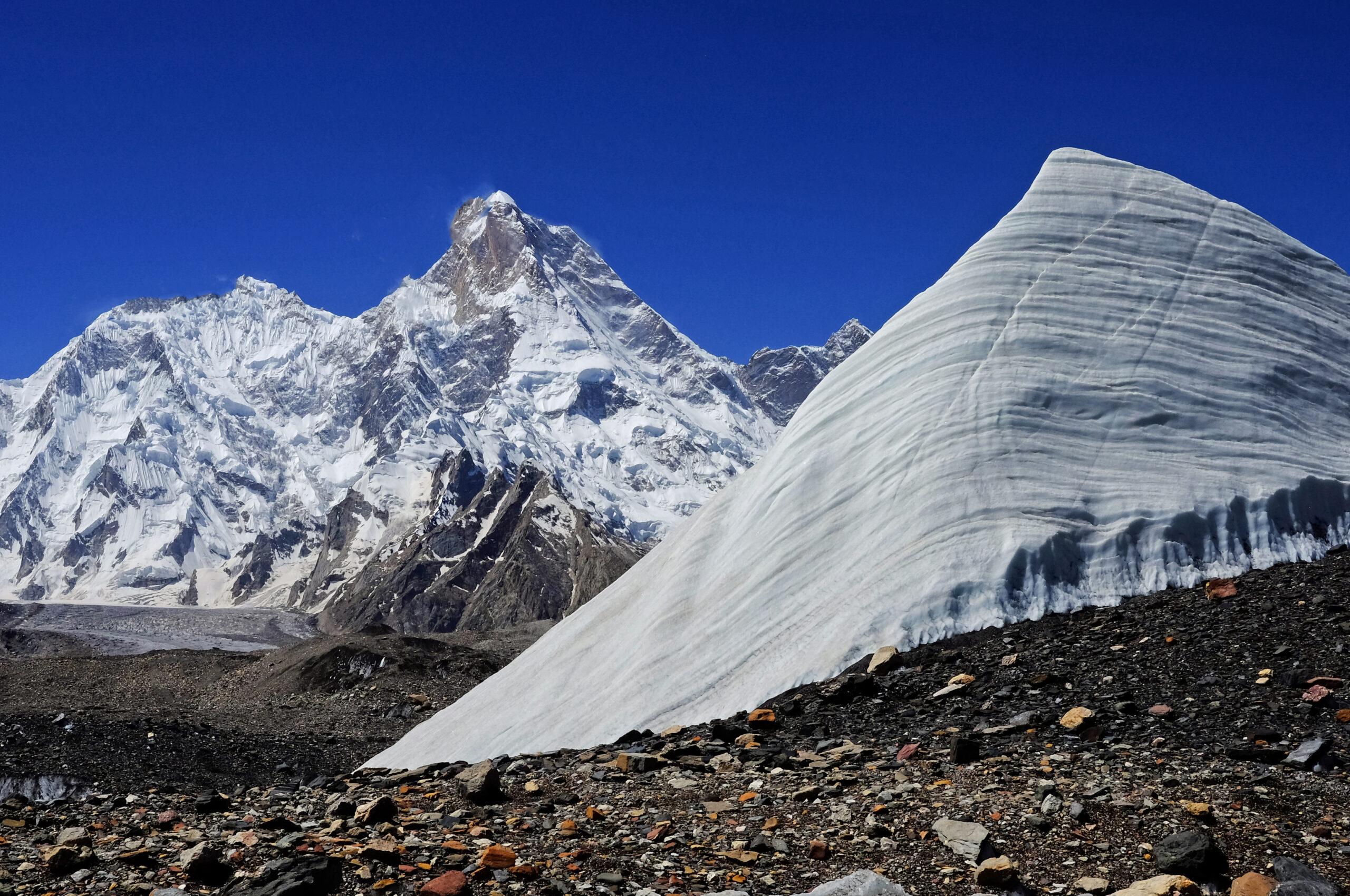 Snow-plastered Karakoram terrain showing the route-breaking problem after storms