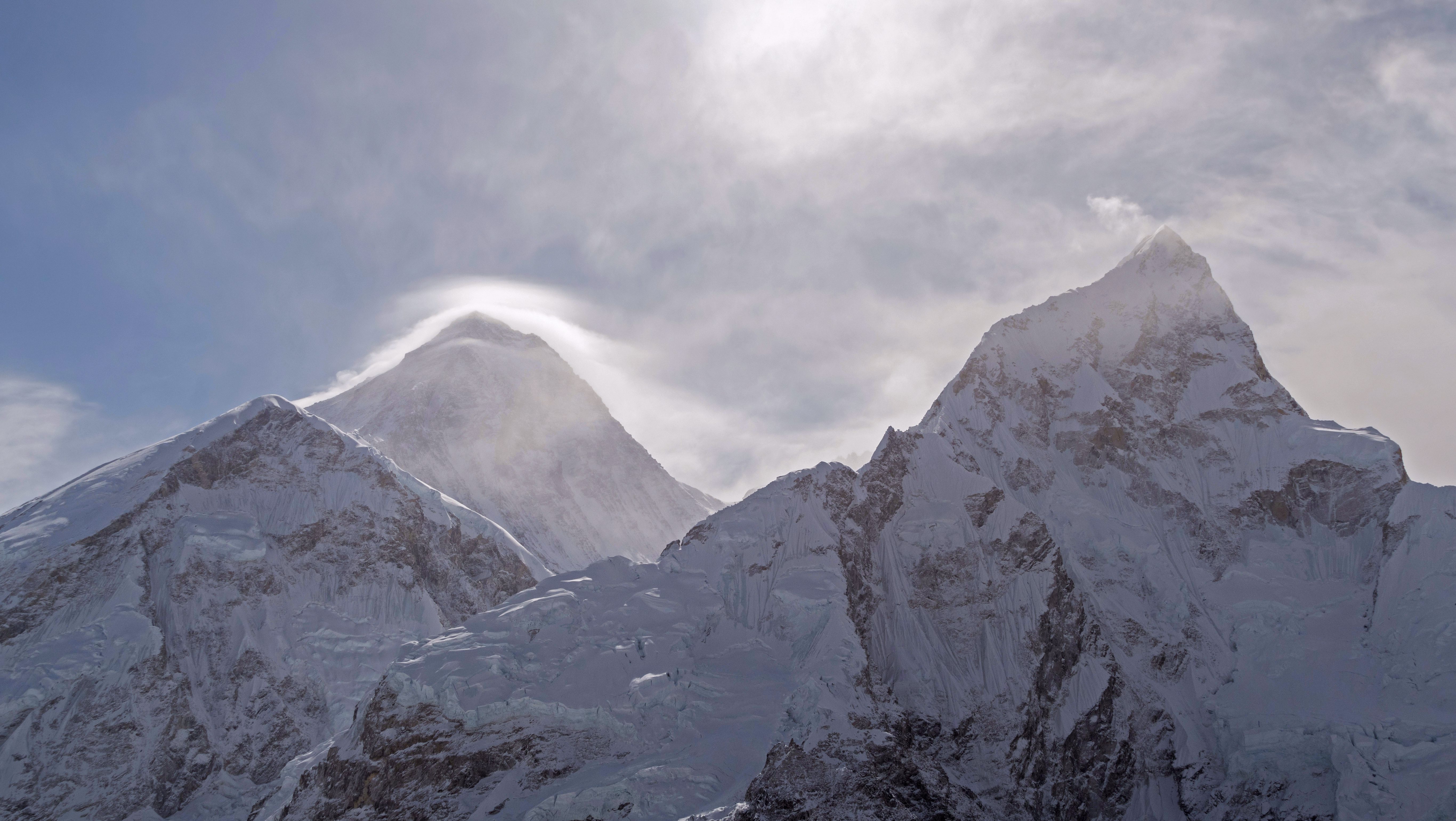 Mount Everest south face and Nuptse at sunrise above the Himalayan glaciers