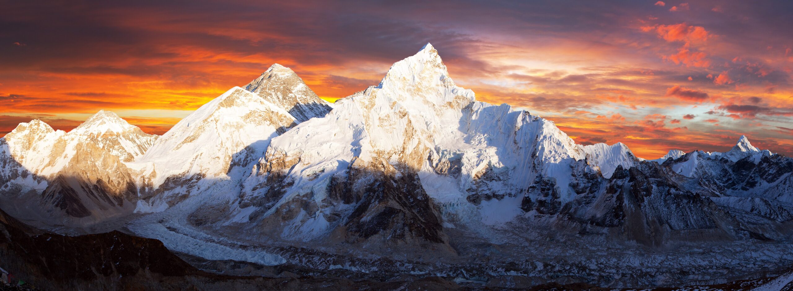 Everest region peaks at sunrise above glaciers