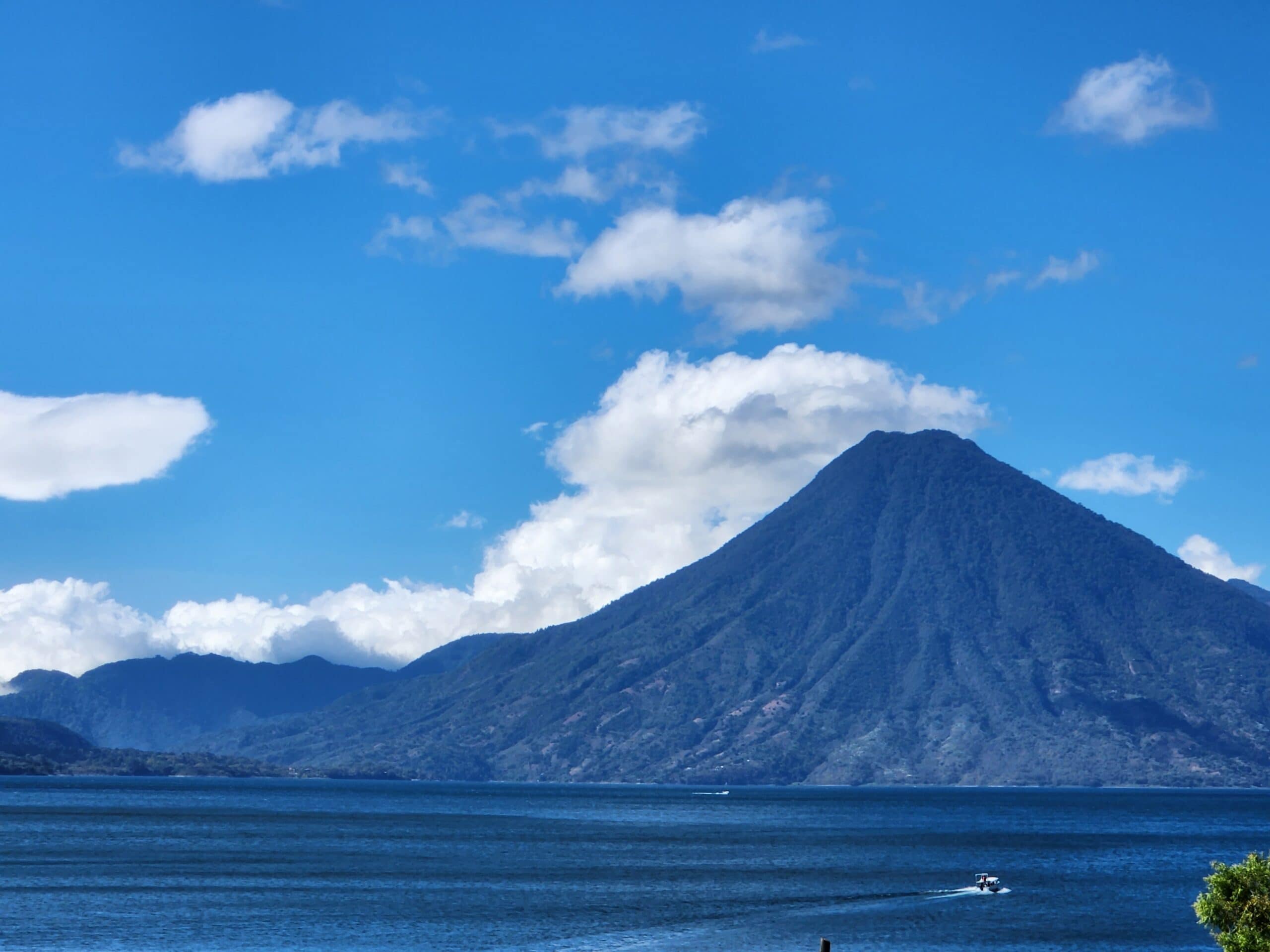 "Escape to serene Lake Atitlan – embrace breathtaking volcanic views and tranquil natural beauty."