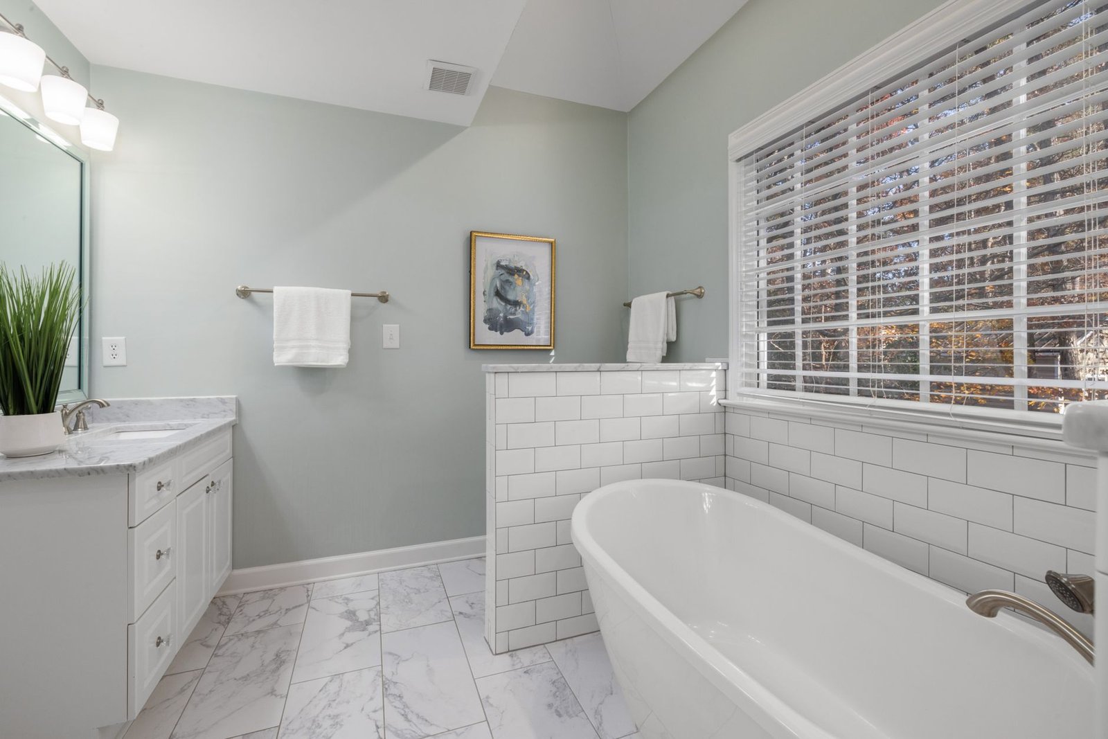 Bathroom Renovation project in Cambridge - Bright and serene modern bathroom with elegant fixtures and a calming ambience.