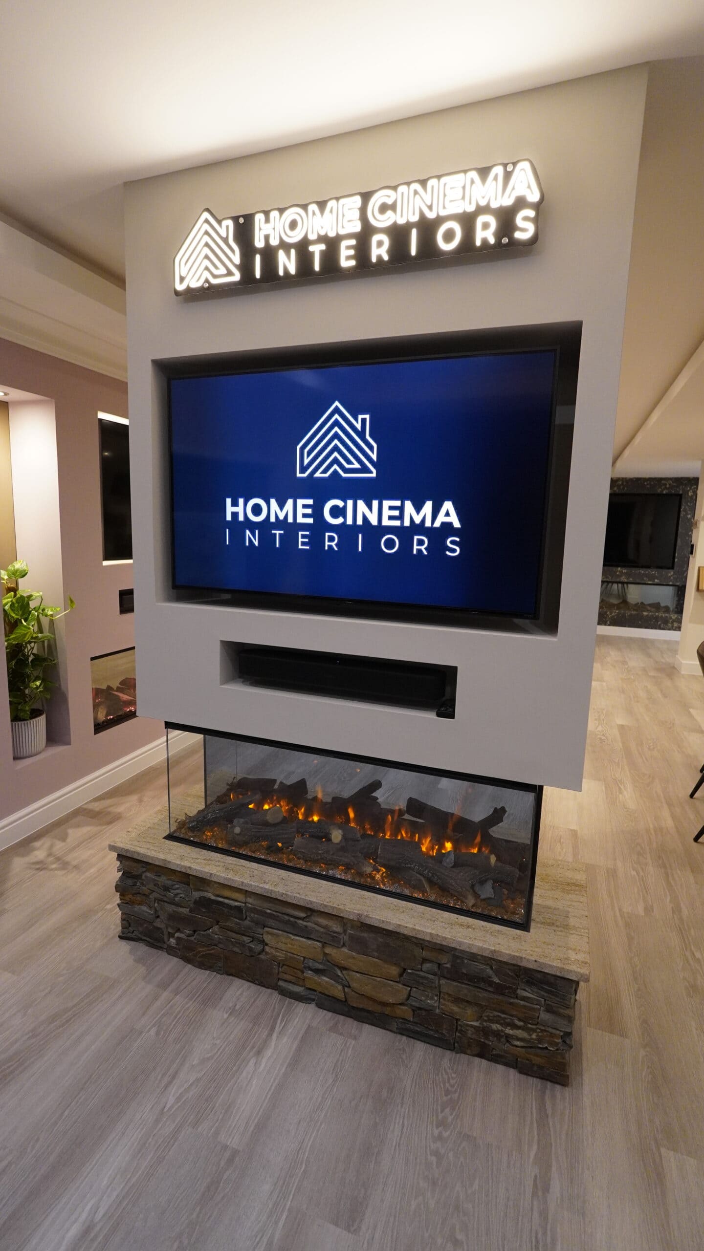 Showroom Chimney Breast Media Wall New Forest Fire Zclad natural stone Neon light