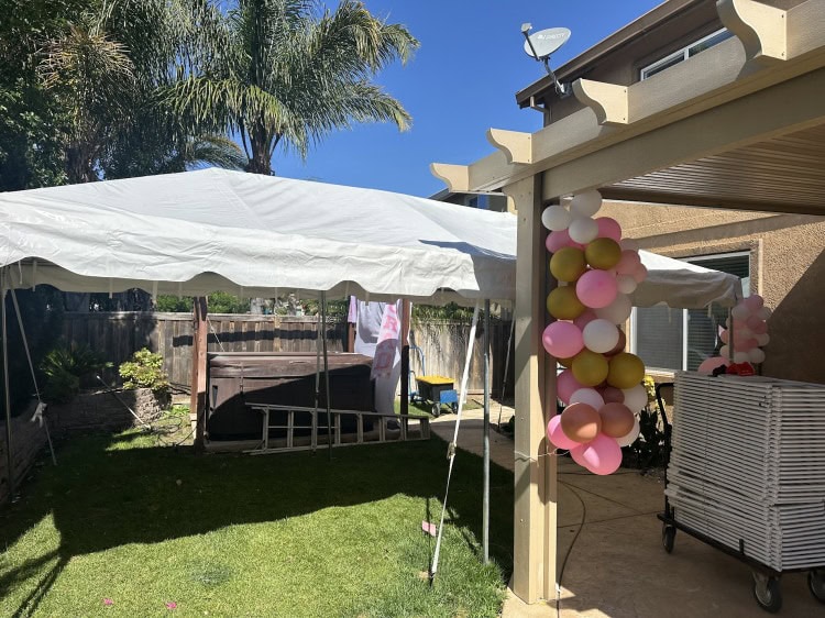 10x20 frame tent shading a backyard party in Vacaville