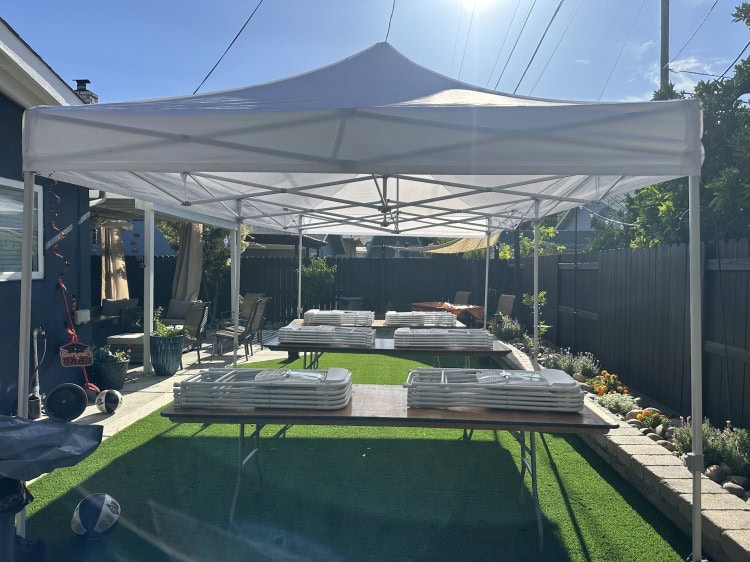 10x20 white pop-up canopy over backyard seating in Vacaville