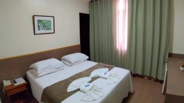 Quarto duplo com ar-condicionado