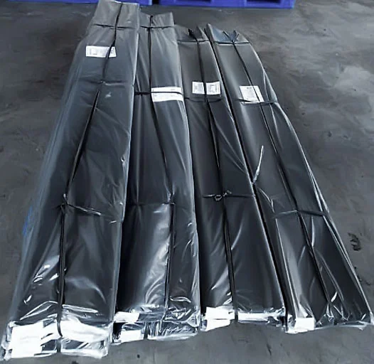 Neatly stacked black LLDPE plastic films for packaging Neatly stacked black LLDPE plastic films for packaging