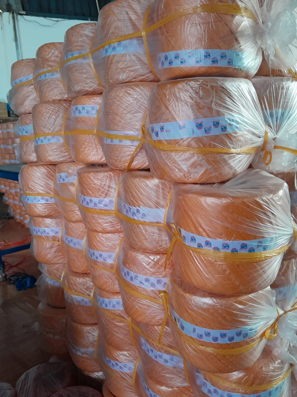 Pack of yellow raffia twine neatly bundled Pack of yellow raffia twine neatly bundled