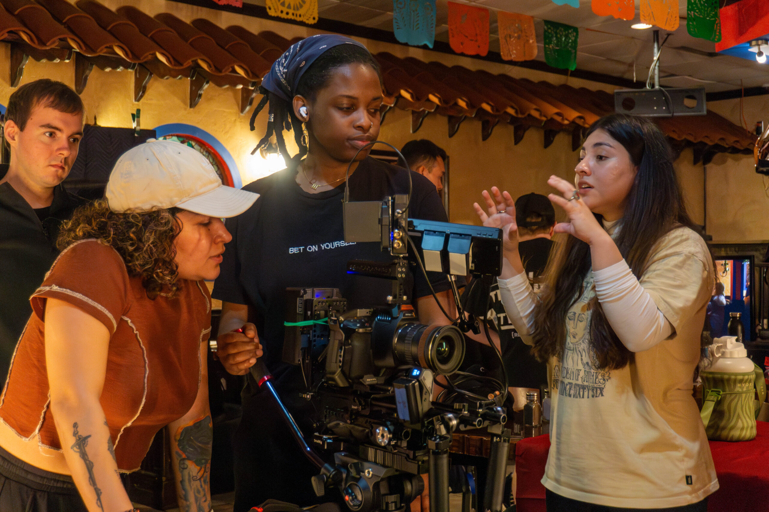 BTS — Itzel and Colbie Inez listening to director Lisa Cerda