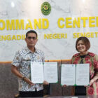 Kepala Dinas Kominfo Muarojambi dan Ketua Pengadilan Negeri Sengeti menandatangani kerja sama, Kamis | dki-mj