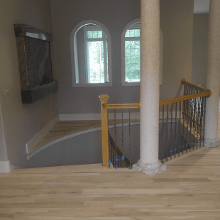 Before stair landing hardwood floor refinishing