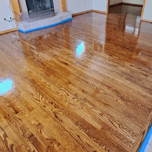 After hardwood floor refinishing in living room