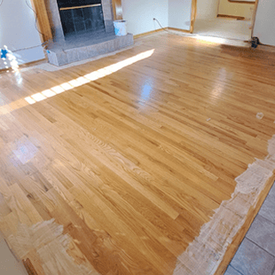 Before hardwood floor refinishing in living room