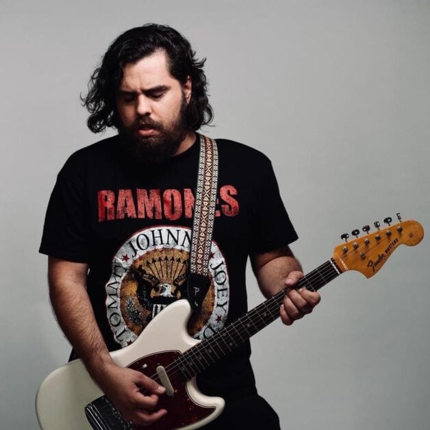 Miguel Comas (Guitar, Vocals) playing guitar