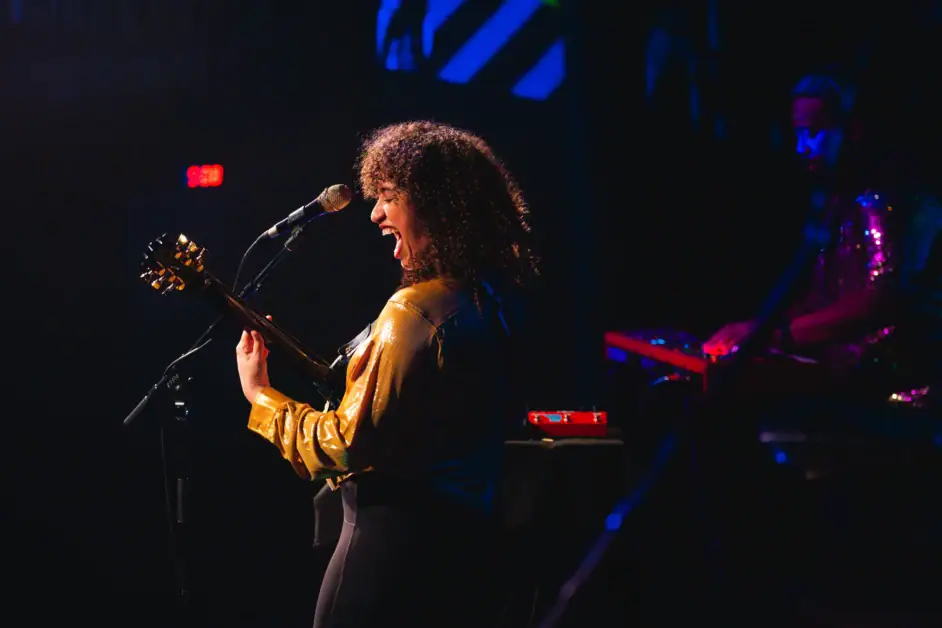 Jackie Venson performing on stage