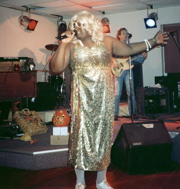 Ned Green as Geralding singing on stage Joe's Place