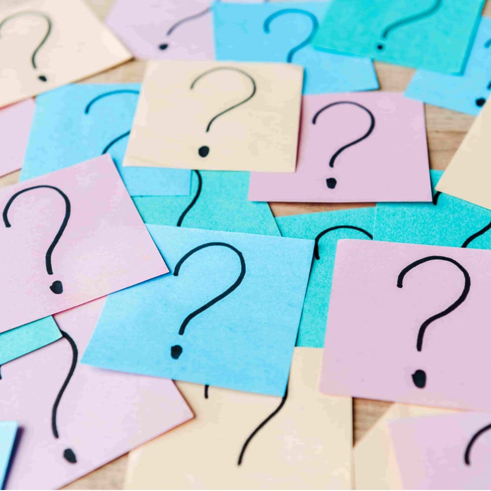 Question marks representing the uncertainty of a contested divorce