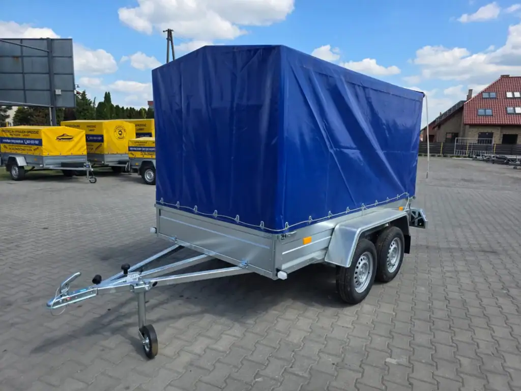 Przyczepa dwuosiowa lekka Rydwan C750/E3 DMC 400-750 kg Przednia burta otwierana.