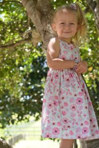 Girls wearing a dress, Australian handmade children's clothing by Karousel Kids