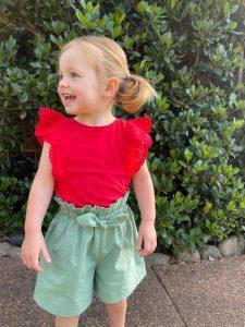 Haidee wearing Australian handmade children's clothing by Karousel Kids