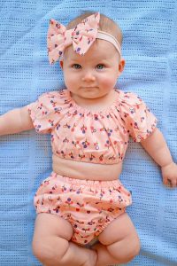 Eloisa wearing Australian handmade children's clothing by Karousel Kids