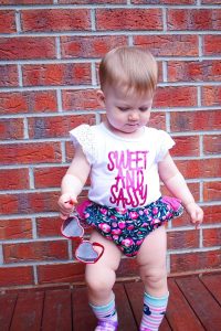 Eloisa wearing Australian handmade children's clothing by Karousel Kids