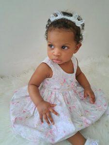 Model is wearing a Handmade white vintage roses Tea Party Dress