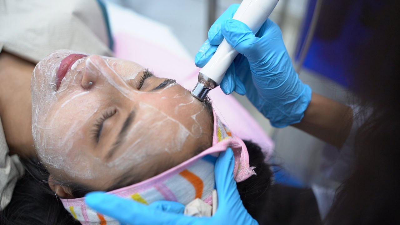 HydraFacial treatment being performed for deep skin cleansing and hydration