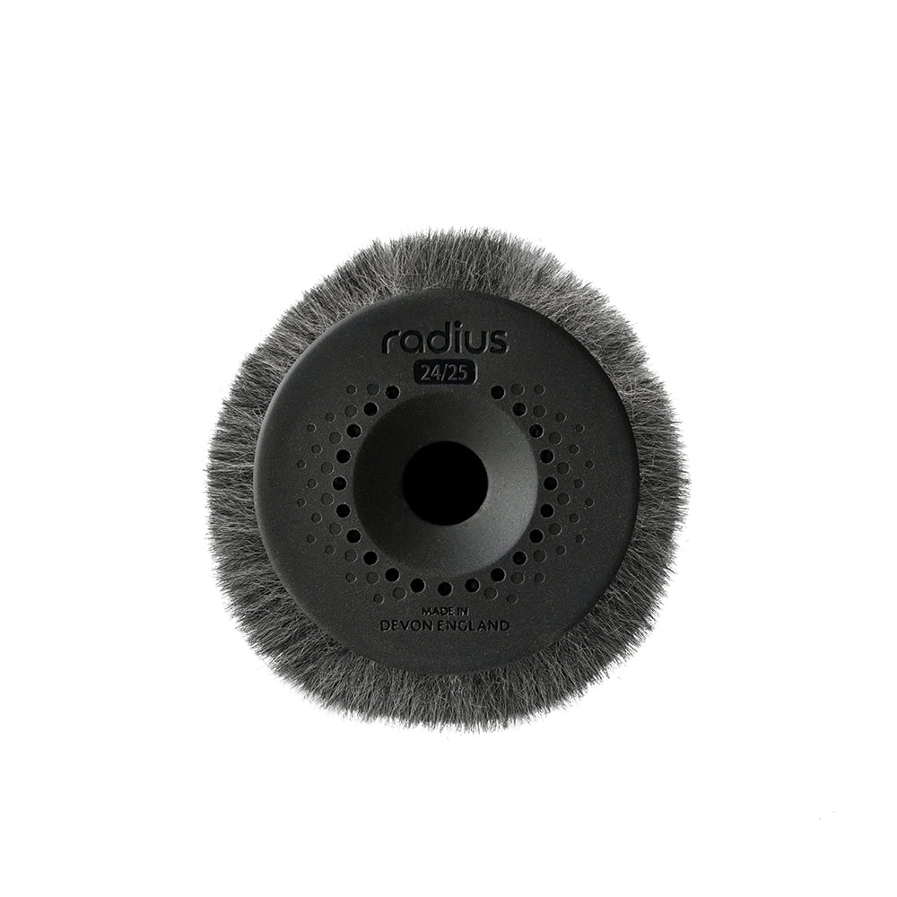 Close-up view of perforated end cap design on professional microphone windshield