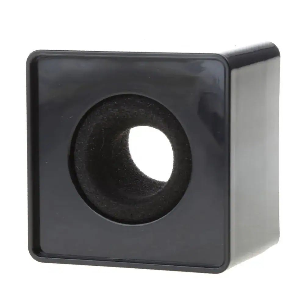 Angled view of a blank black square plastic microphone flag (mic cube) with a circular foam insert and center hole, shown on a white background.