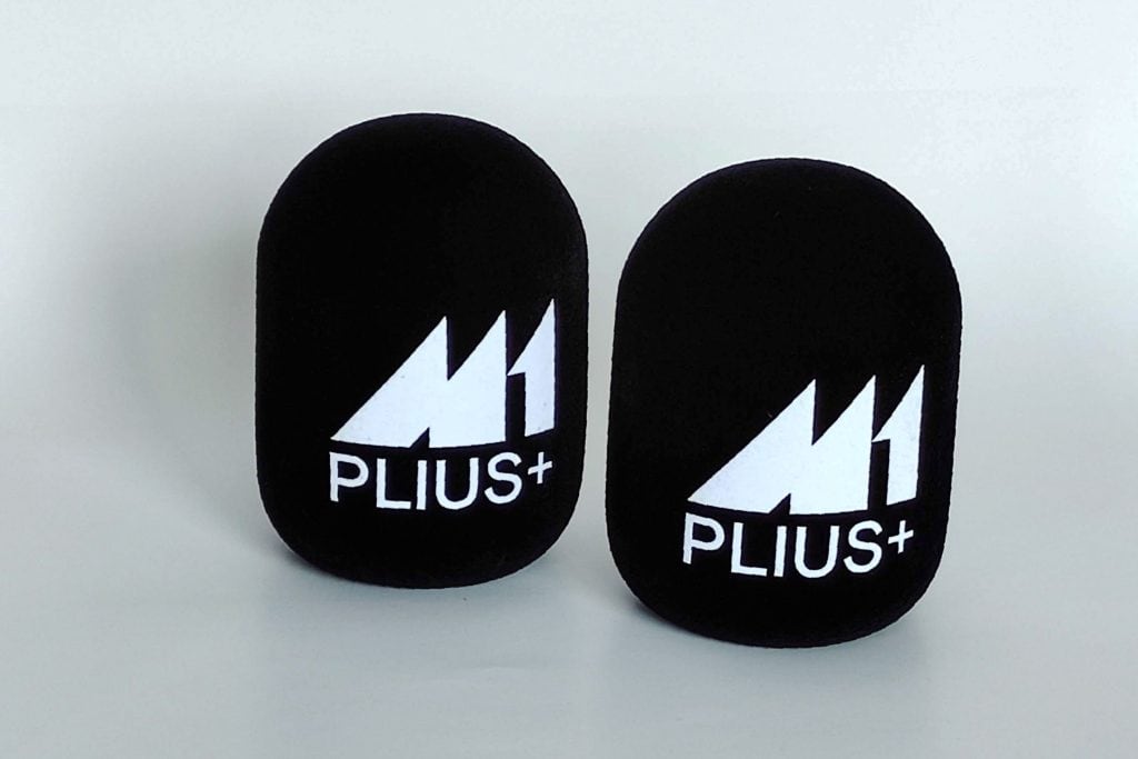 M1 PLIUS+ Lithuanian radio branded studio microphone windshields with black cylindrical foam and white logo