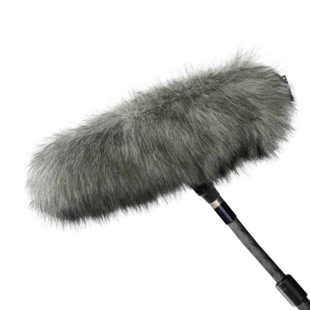 Professional shotgun microphone mounted in Mini-ALTO 280 windshield system during field recording