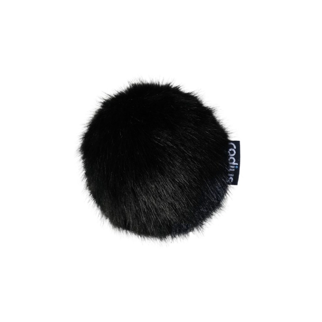 Close-up view of multi-pile synthetic fur windcover construction